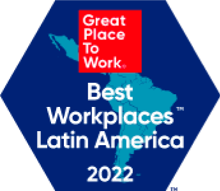 "Great Place To Work" in a red square above "best workplaces latin america 2022" on a blue background with a map outline of latin america. "Great Place To Work" in a red square above "best workplaces latin america 2022" on a blue background with a map outline of latin america.