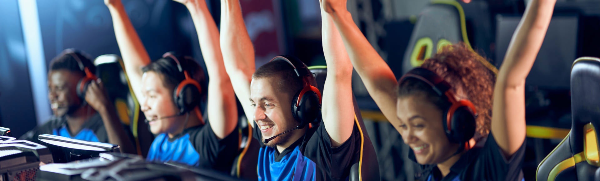 Young people having fun in a modern Gaming Arena 