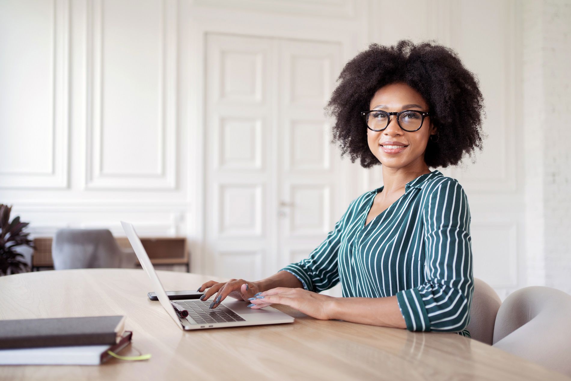 African business woman working on her laptop 