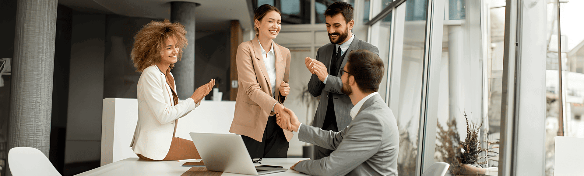 Group of business people shaking hands at the office