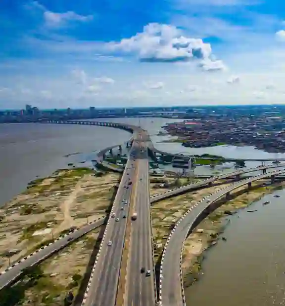 A city landscape of a highway leading into a major city