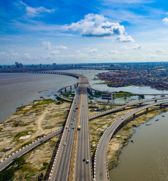 A city landscape of a highway leading into a major city