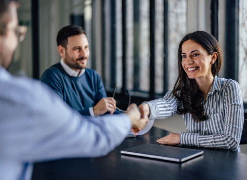 Professional handshake symbolizing partnership, trust, and successful collaboration in a business environment.