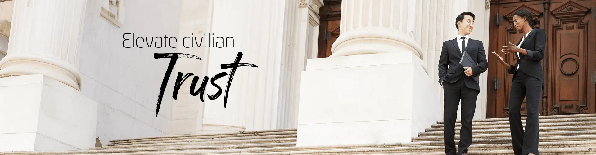 Business couple walking down the stairs