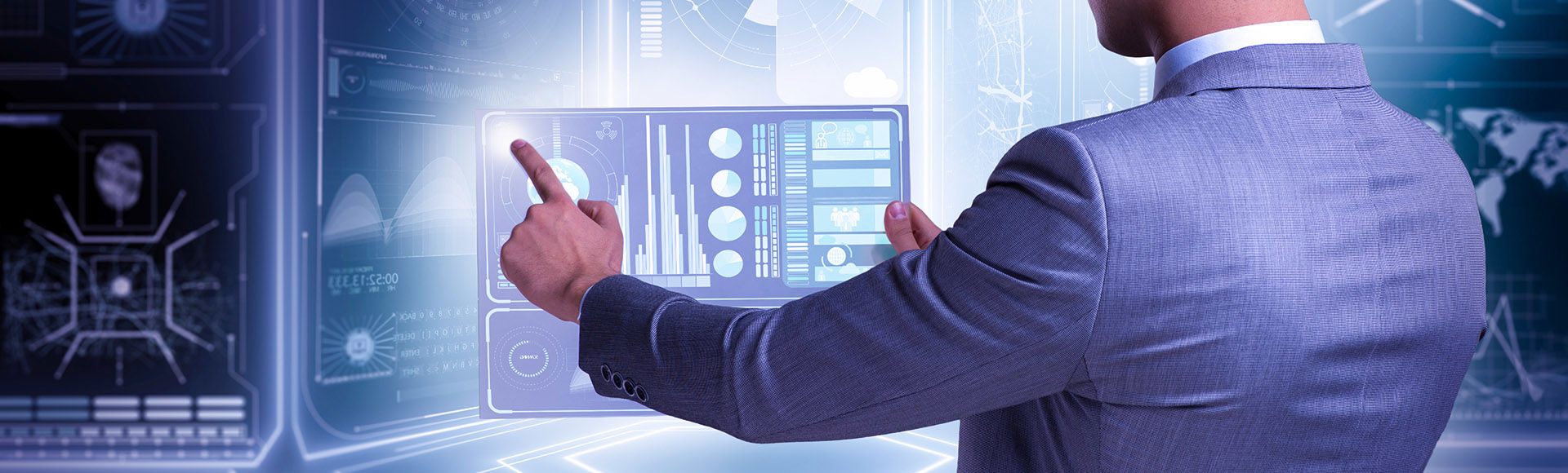 A businessman in a suit interacts with a futuristic touchscreen dashboard displaying data visualizations.