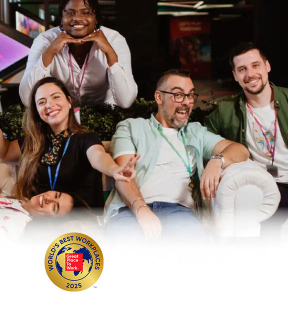 Team members celebrate a shared achievement, marking TP’s Top 10 World’s Best Workplaces 2025.