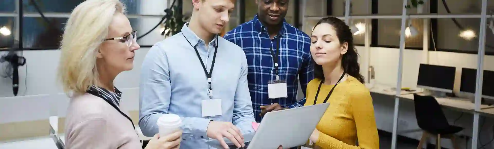 Group of people working on a laptop