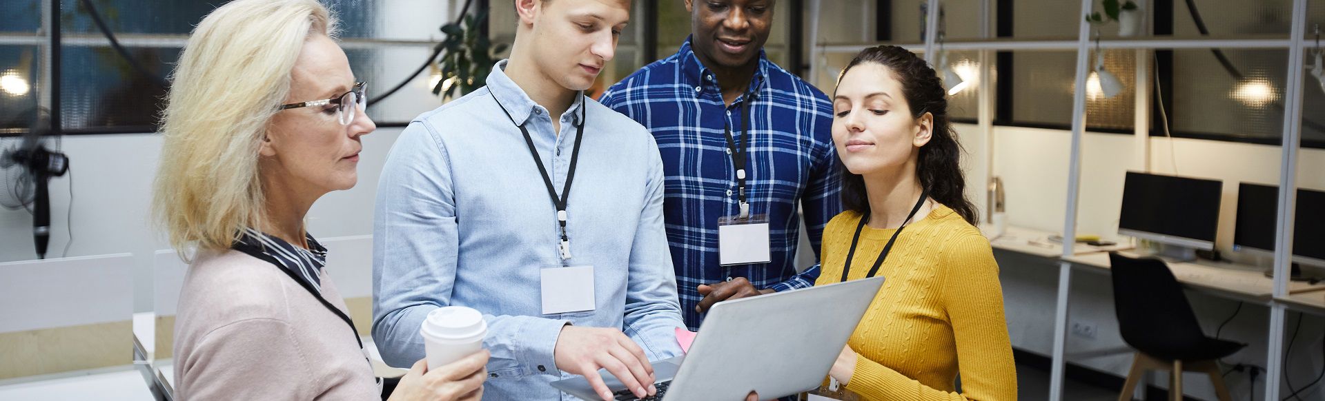 Group of people working on a laptop
