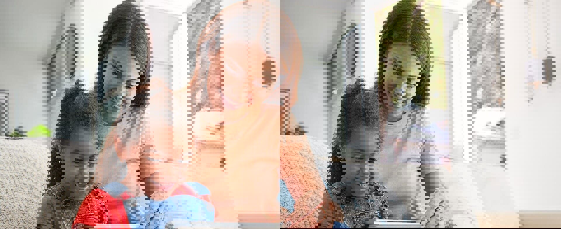 O ChatGPT disse:  Woman caring for a child, illustrating PR on supporting 60,000 children, including 10,000 from India, in 2022