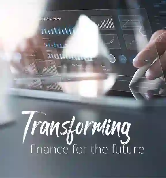 Person analyzing data on a transparent digital dashboard, highlighting analytics in a modern finance and accounting setting.