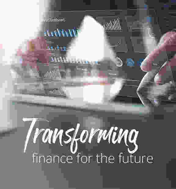Person analyzing data on a transparent digital dashboard, highlighting analytics in a modern finance and accounting setting.
