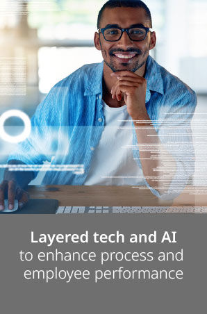 Smiling man holding his chin and looking toward the camera