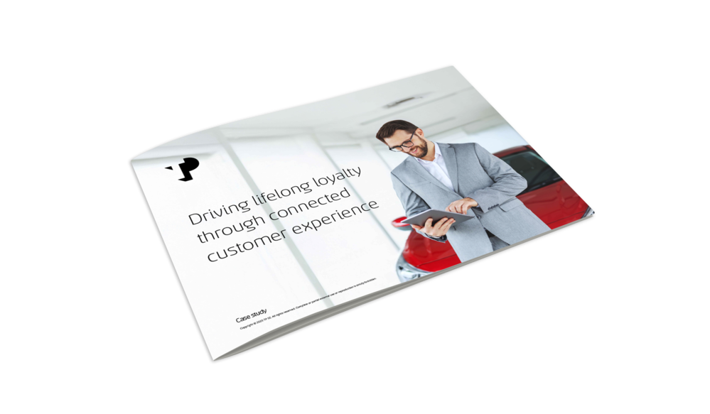 A man in an elegant suit uses a tablet in front of a car, reflecting luxury and innovation. The image illustrates a client story on driving lifelong loyalty through connected customer experience.