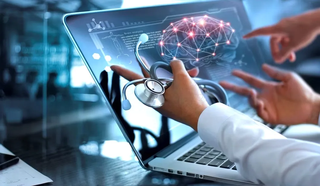 Doctor reviewing digital medical data on a laptop with a stethoscope and brain network graphic.