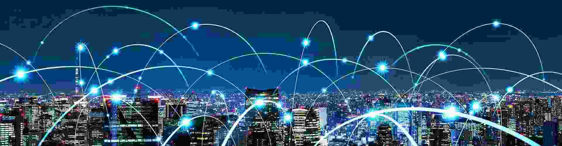 Banner showing a modern, brightly lit city with 3D lines simulating digital connections between its inhabitants.