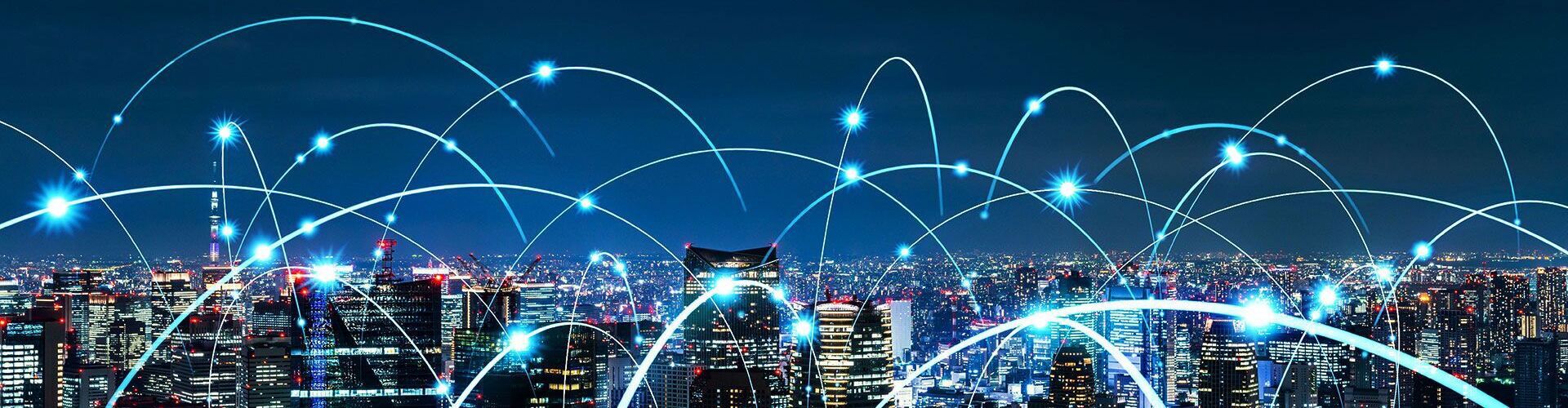 Banner showing a modern, brightly lit city with 3D lines simulating digital connections between its inhabitants.