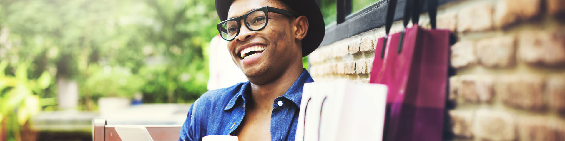 Smiling african man wearing a hat 