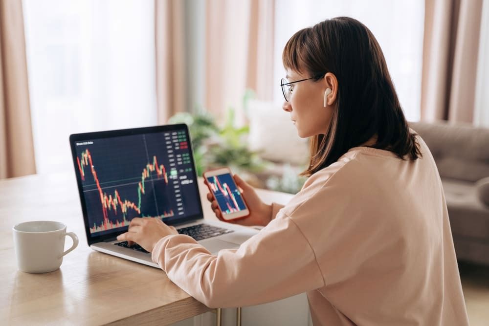 Woman checking the performance of her investments