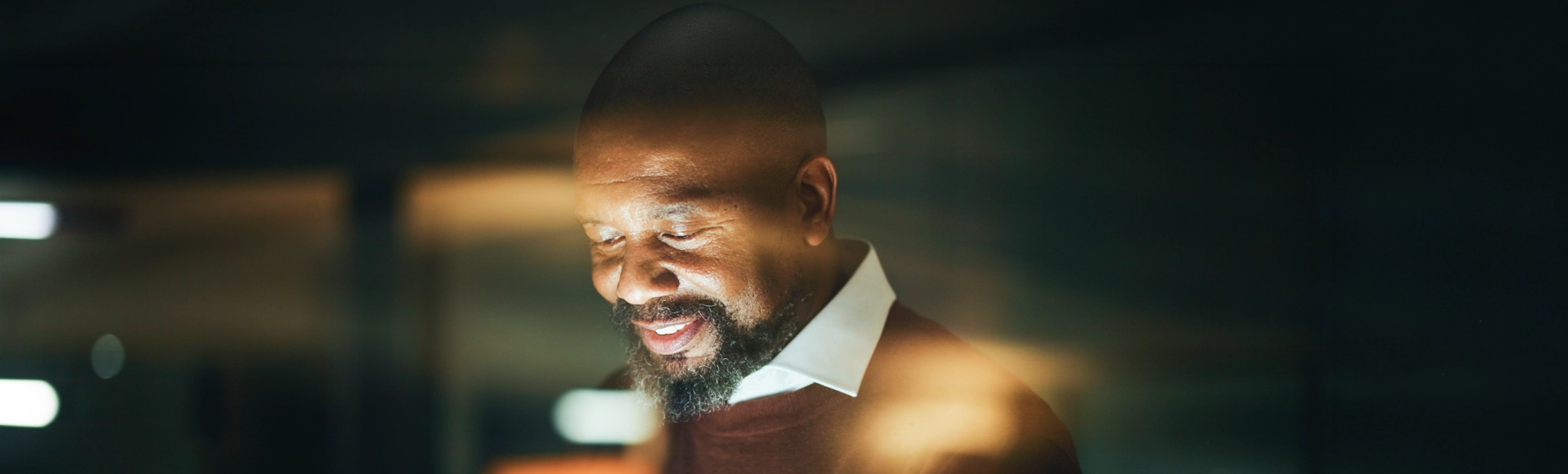 Afro descendant business professional in a corporate setting.