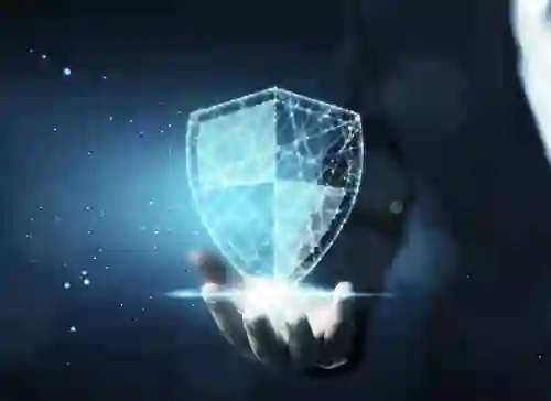 A holographic shield hovers above an open hand, glowing with light, in a dark, digital environment with subtle blue accents.