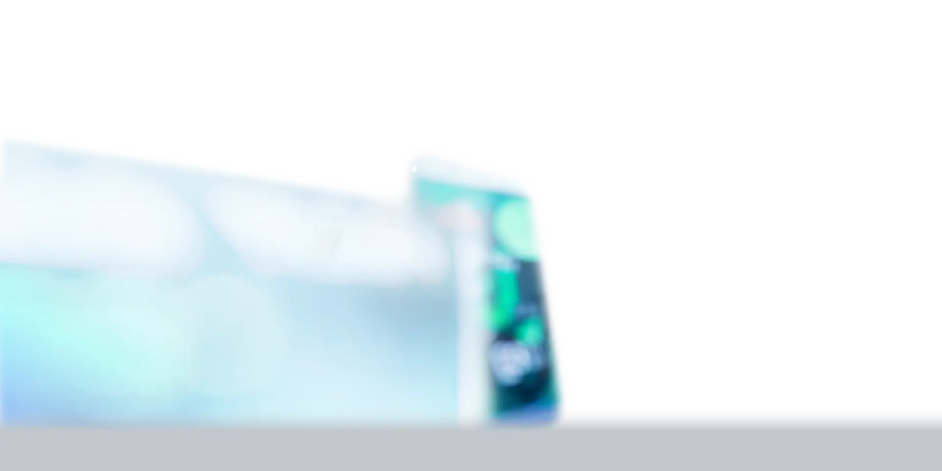 AI by TP displayed over a couple testing a smartphone in a store.