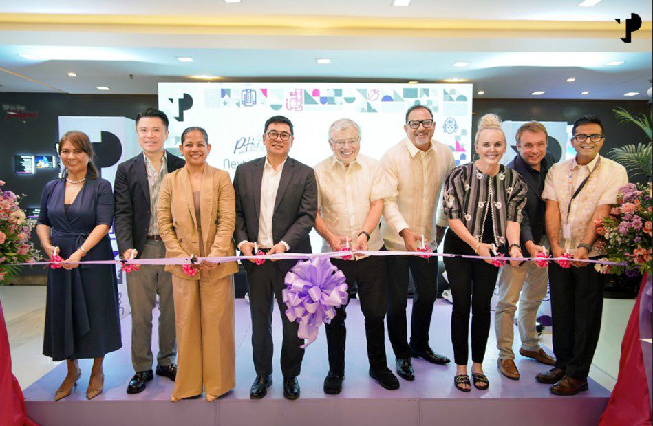 TP executives and partners cut the ribbon at a new TP site opening ceremony.