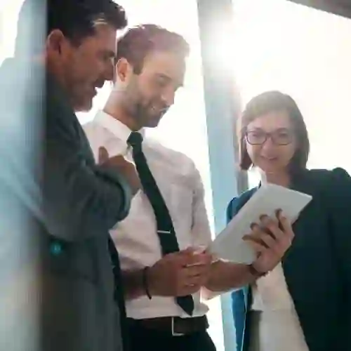 Team working together on a tablet
