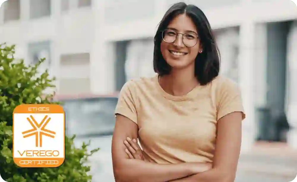 Young smiling woman with crossed arms 