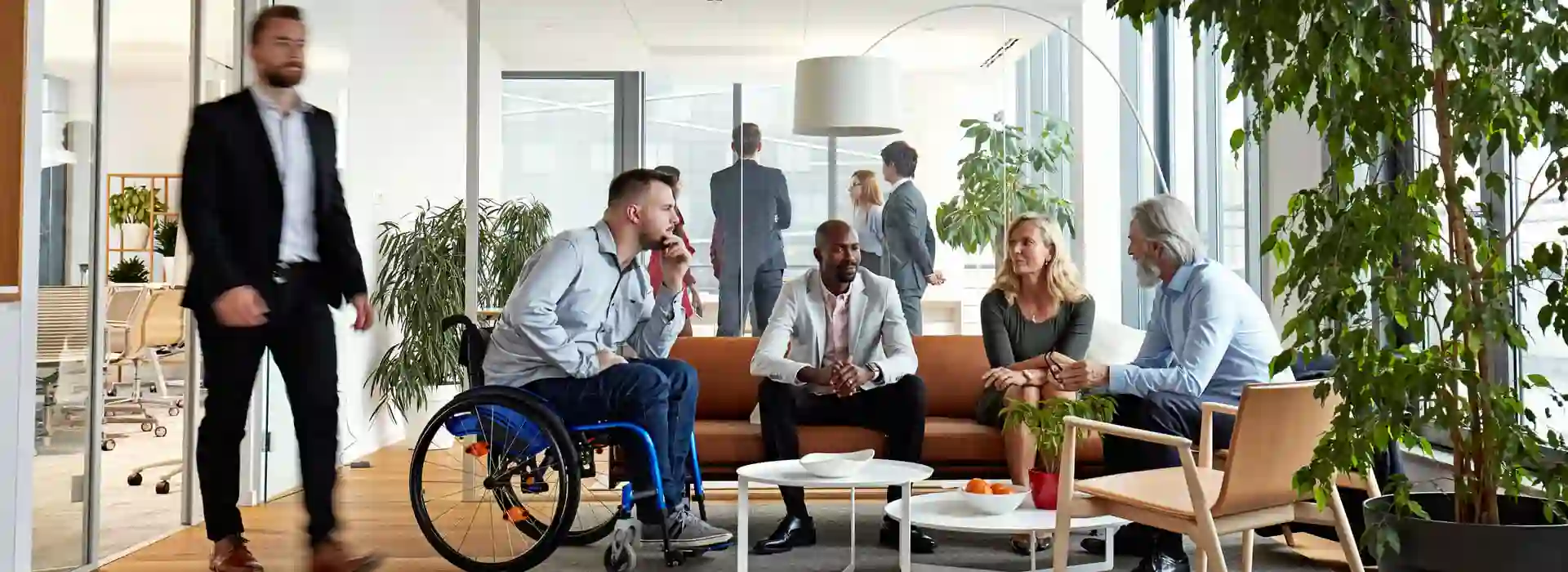 Diverse group of office workers on a modern meeting room