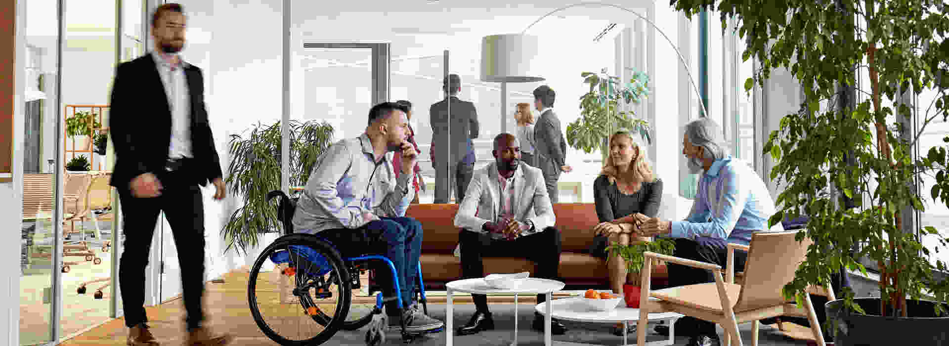 Diverse group of office workers on a modern meeting room