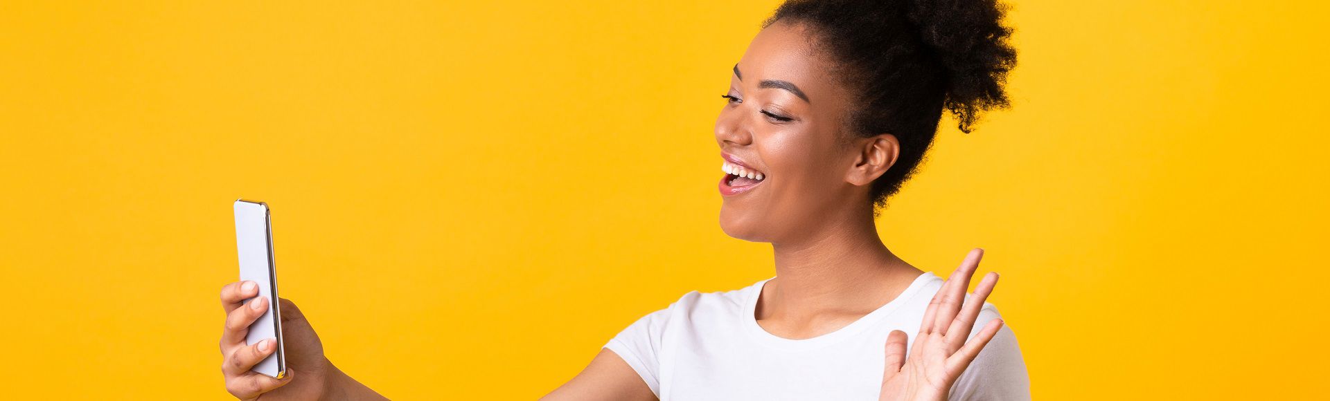 Smiling girl Making Video Call Using Mobile