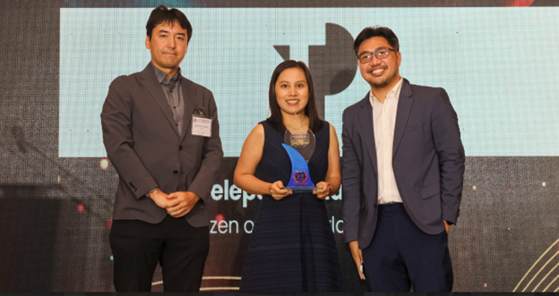 Rechelle Facun (center) and Marketing Manager Adrian Elumba (right) proudly represent TP at the Gold Award for Community Support and Engagement at the inaugural American Chamber of Commerce of the Philippines