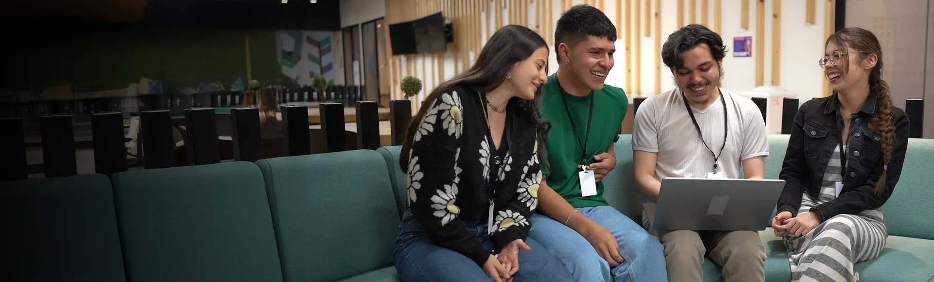 TP employees smiling together in the office, showing team spirit and belonging.