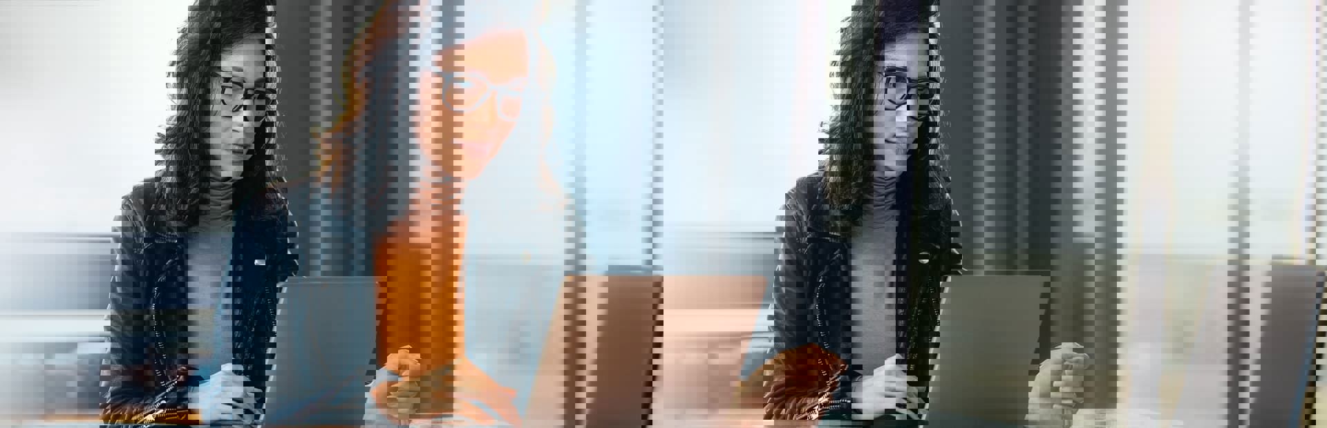 Woman working from home, representing TP’s Cloud Campus winning gold as Best Work-at-Home solution.