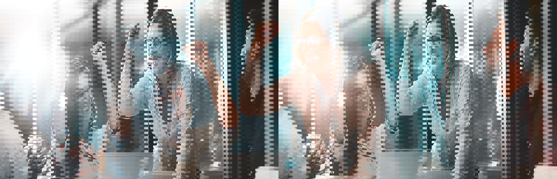 Business team celebrating a collective achievement, reflecting collaboration and success.