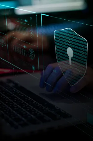 Cybersecurity interface with shield icon protecting data on a laptop.