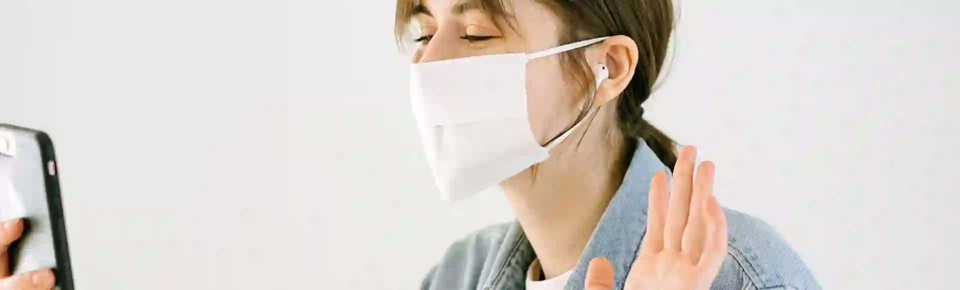 Woman using mask during a video call 