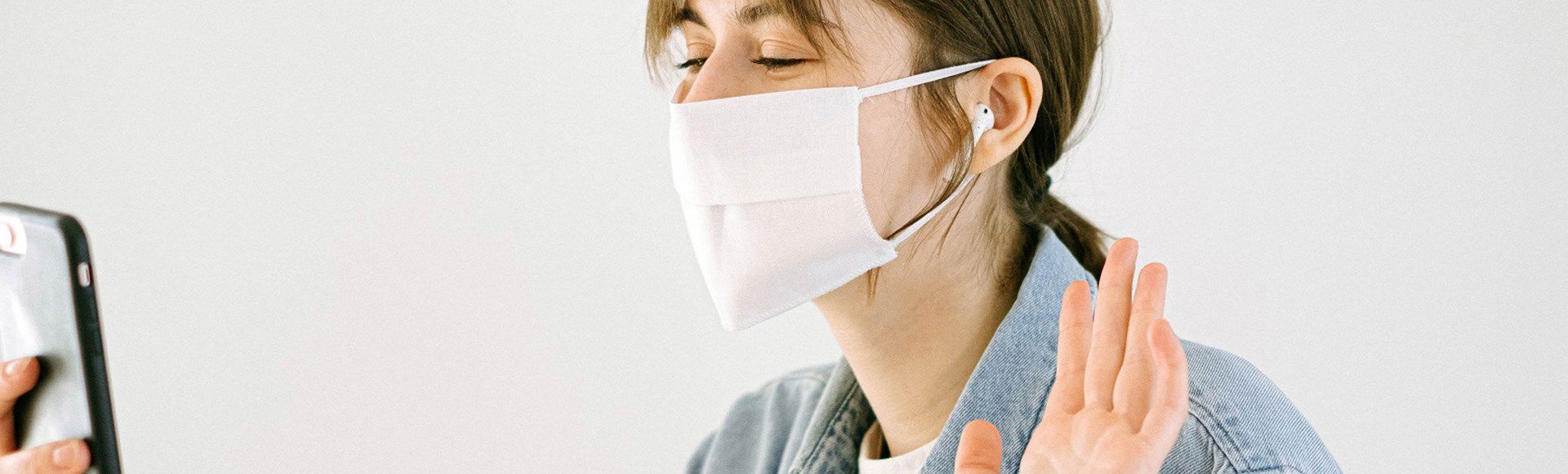 Woman using mask during a video call 