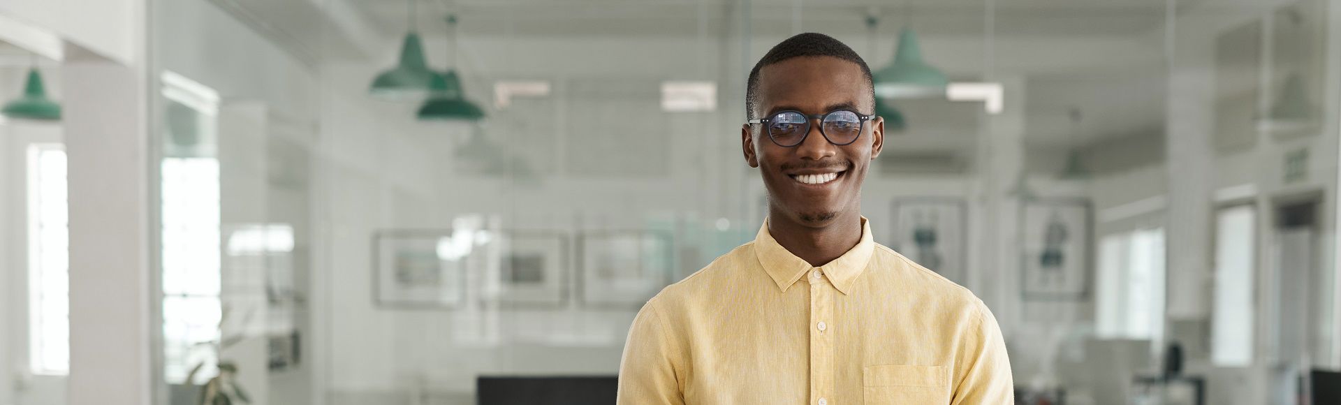 Smiling young African man with glasses working in an office, blog on TP recognized with Frost & Sullivan’s Technology Innovation Leadership award. Smiling young African man with glasses working in an office, blog on TP recognized with Frost & Sullivan’s Technology Innovation Leadership award.
