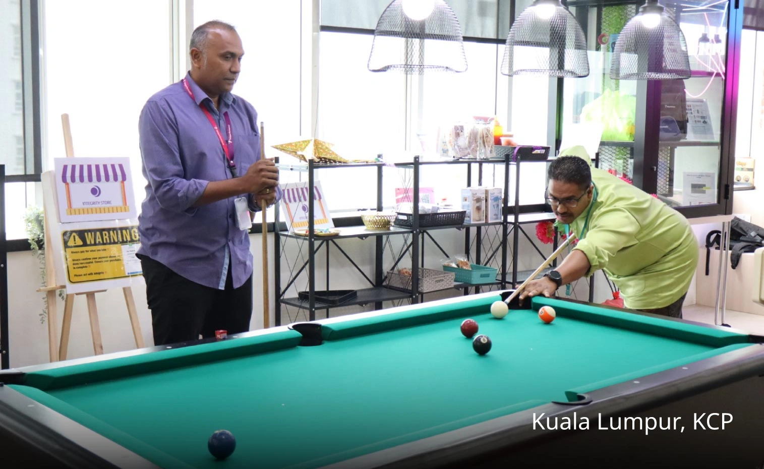 Pool game at TP’s KCP office in Kuala Lumpur, Malaysia.