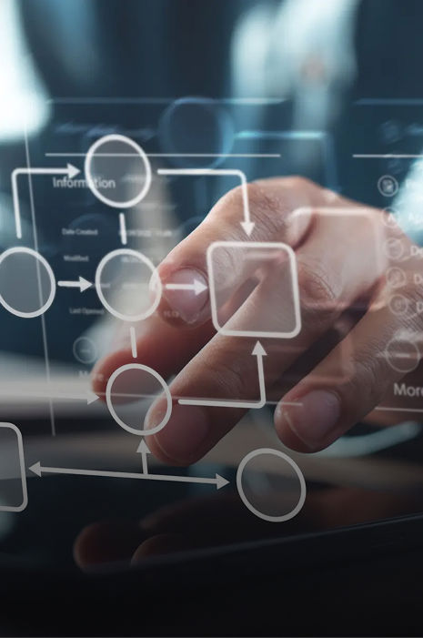 Flowchart overlay highlighting strategic data services as a user works on a computer.