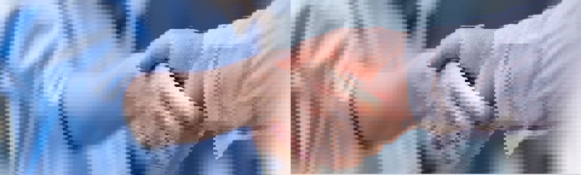 Businesspeople shaking hands, symbolizing partnership and successful collaboration. Businesspeople shaking hands, symbolizing partnership and successful collaboration.