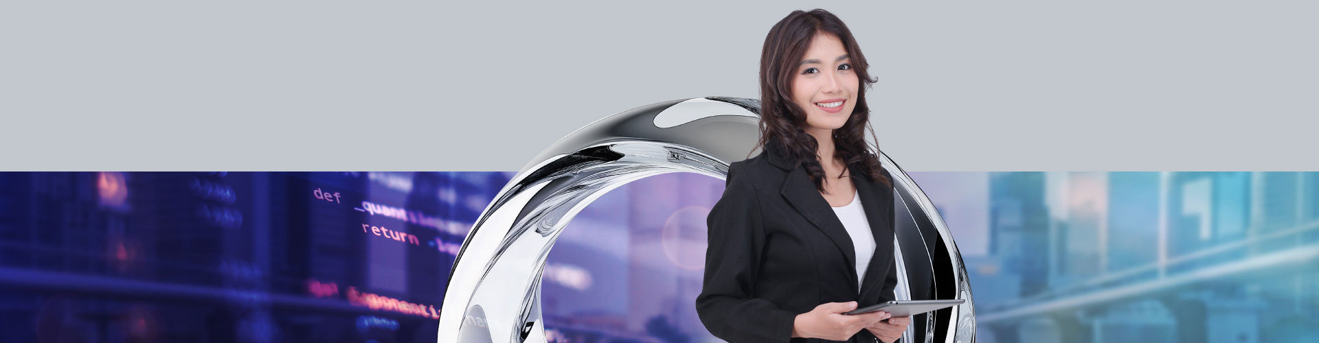 A confident female professional in a black blazer holds a tablet, smiling against a modern urban backdrop