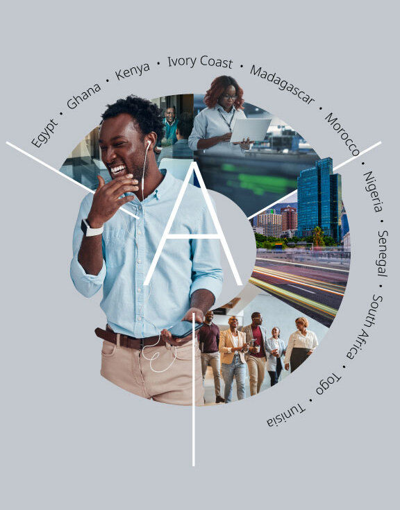 Smiling young African business man using earphones in focus and several images of a modern and innovative Africa in the background