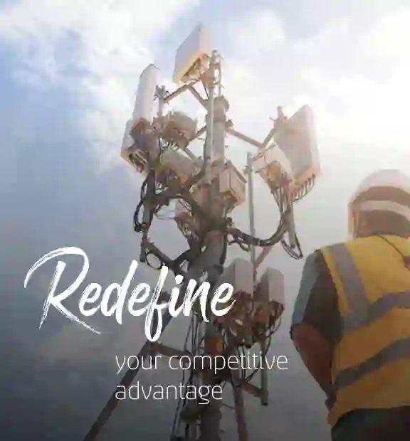Man working on a transmission tower