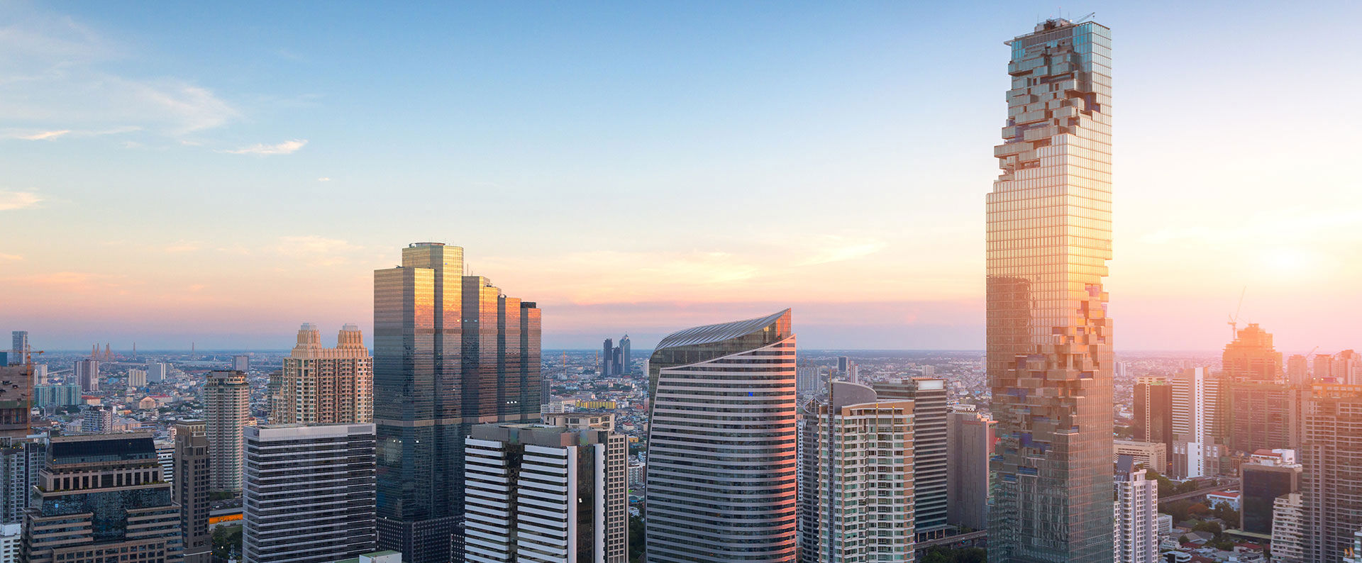 Colorful horizontal stripes alternating between shades of yellow, orange, red, magenta, and blue. 