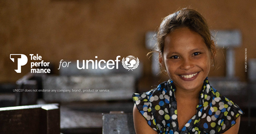 Smiling girl representing partnership between TP and UNICEF.