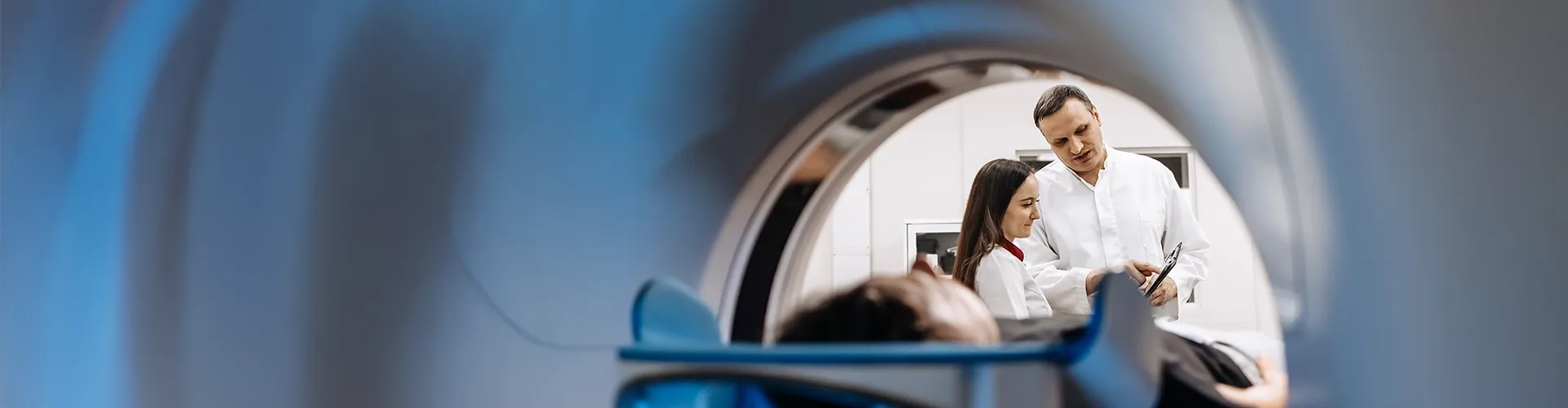 Doctor and nurse discussing a hospital procedure together.