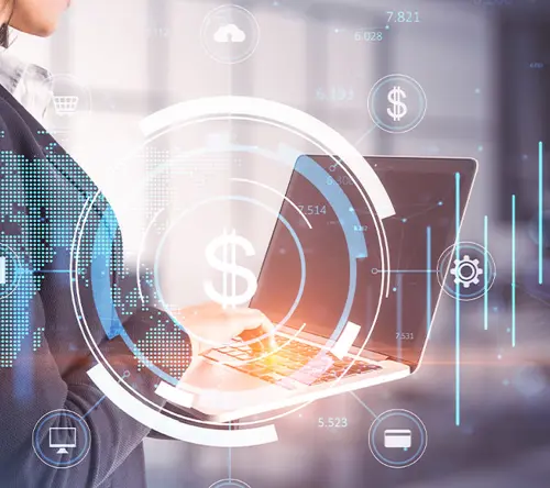 A businesswoman uses a laptop, surrounded by glowing fintech and global digital data overlays