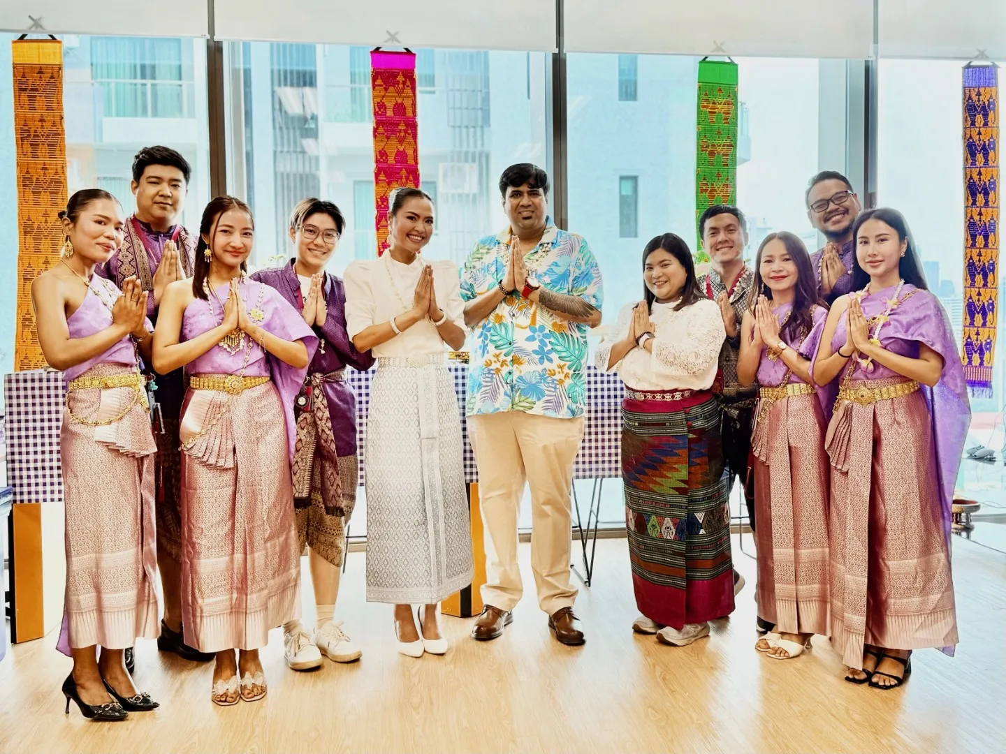 TP employees wearing traditional attire for cultural celebration